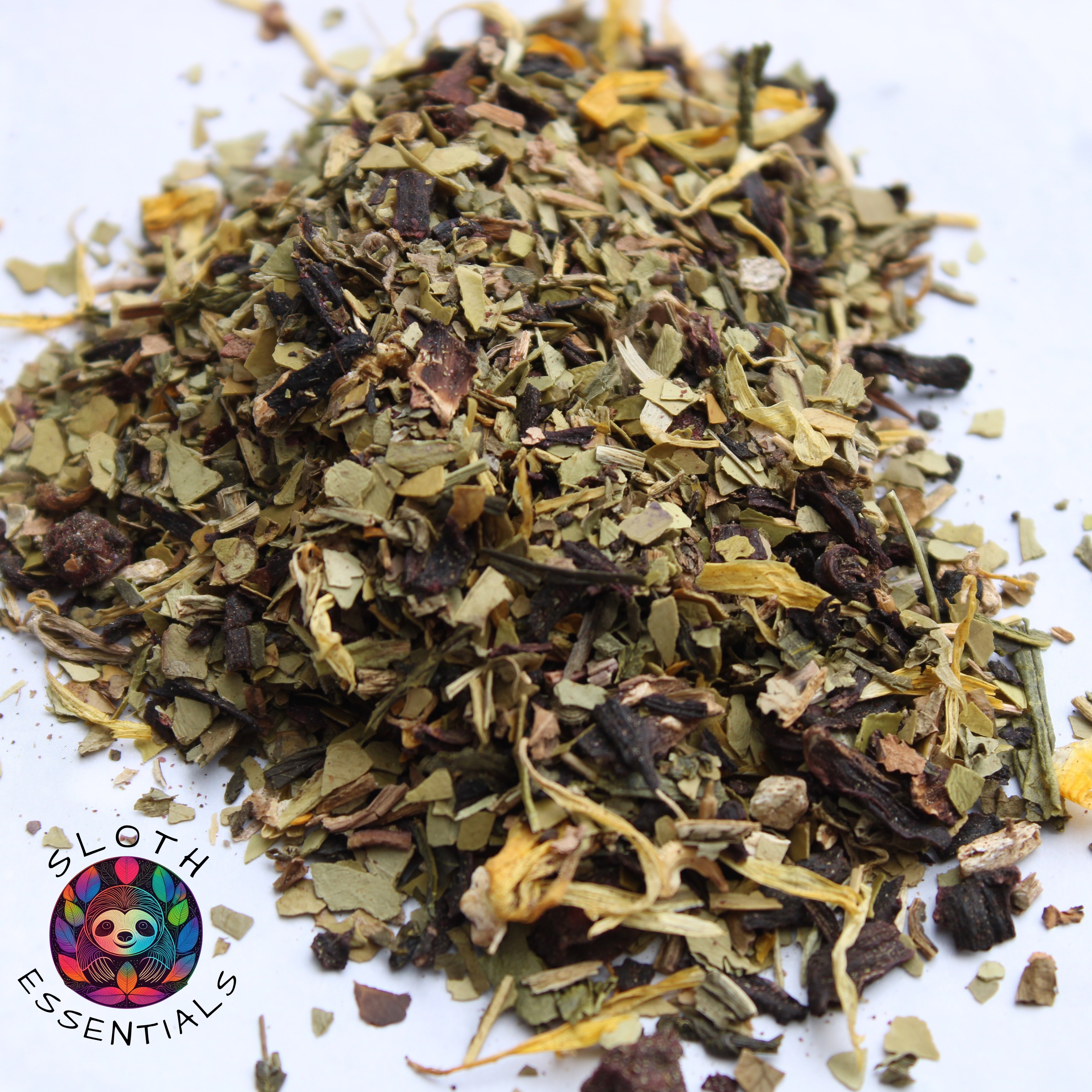 Slim down naturally with our Sloth Slim Down Tea. This organic blend combines burdock root, yerba mate, dandelion leaf, hibiscus, green tea, acai berry, schisandra, garcinia cambogia, and calendula petals to support weight management, boost metabolism, and enhance overall wellness. Embrace your journey to a healthier you with every sip.