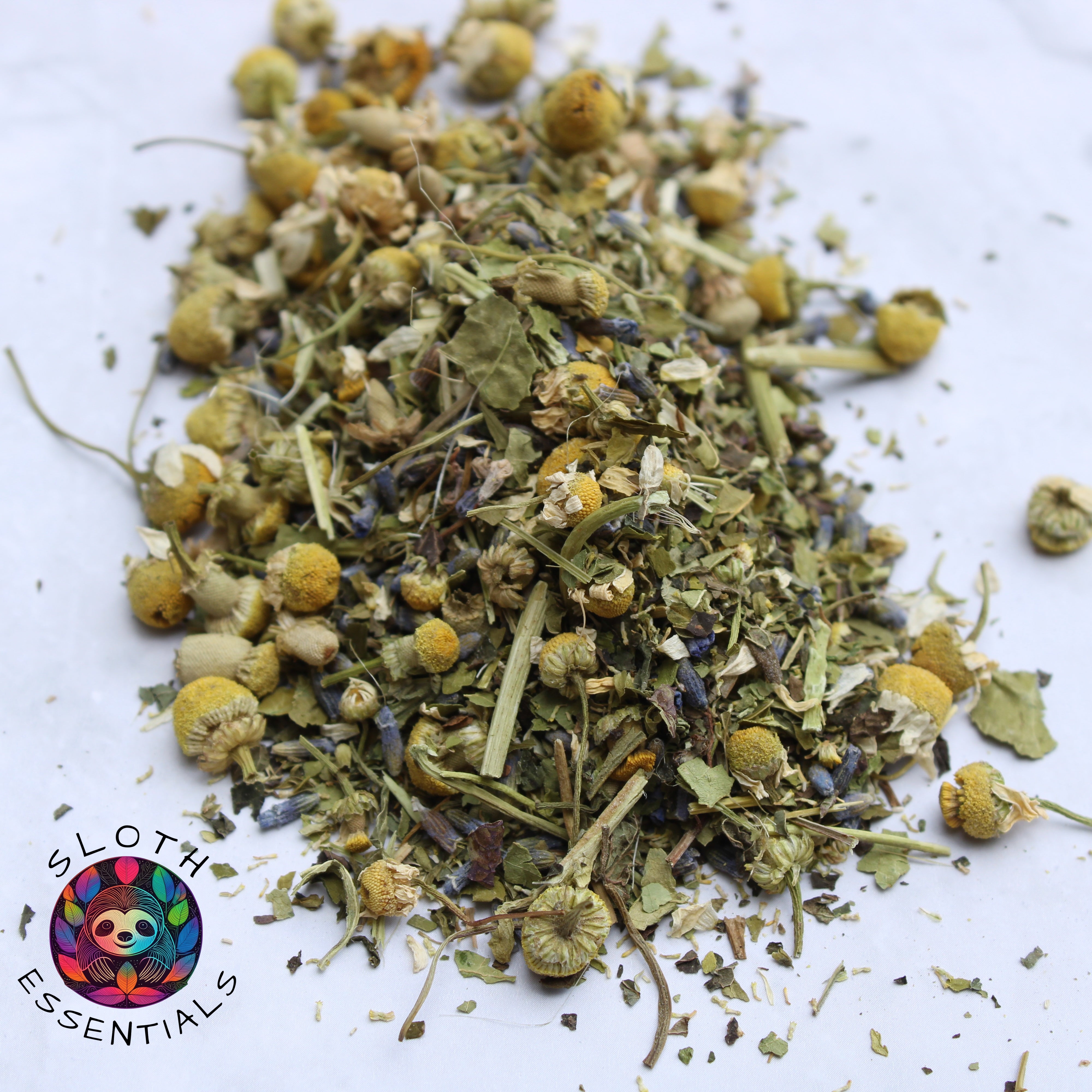 Zoomed-in view of Sloth Snooze Blend ingredients, featuring chamomile, lavender, passionflower, lemon balm, and skullcap.